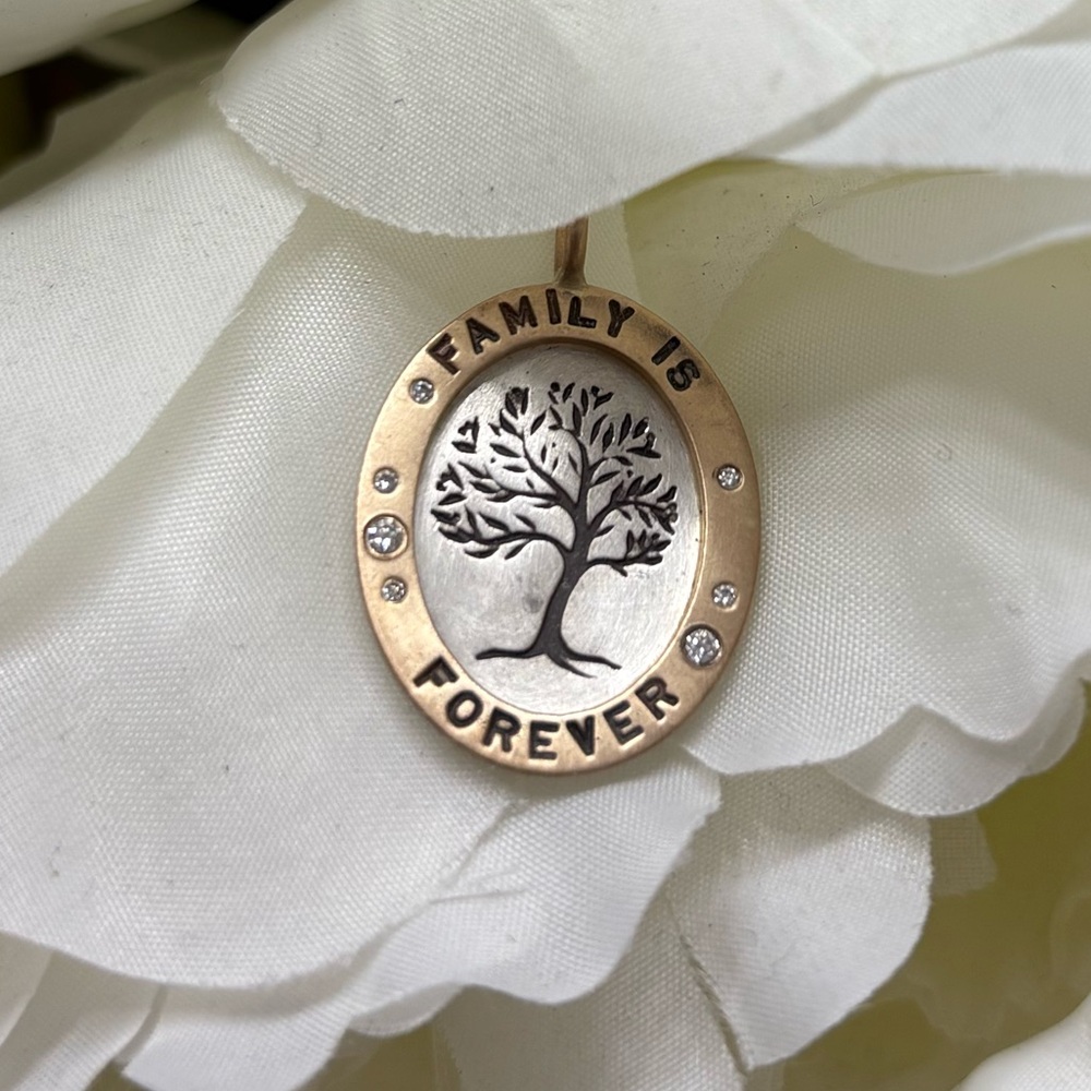 Heather B. Moore family is forever oval charm yellow gold and diamonds